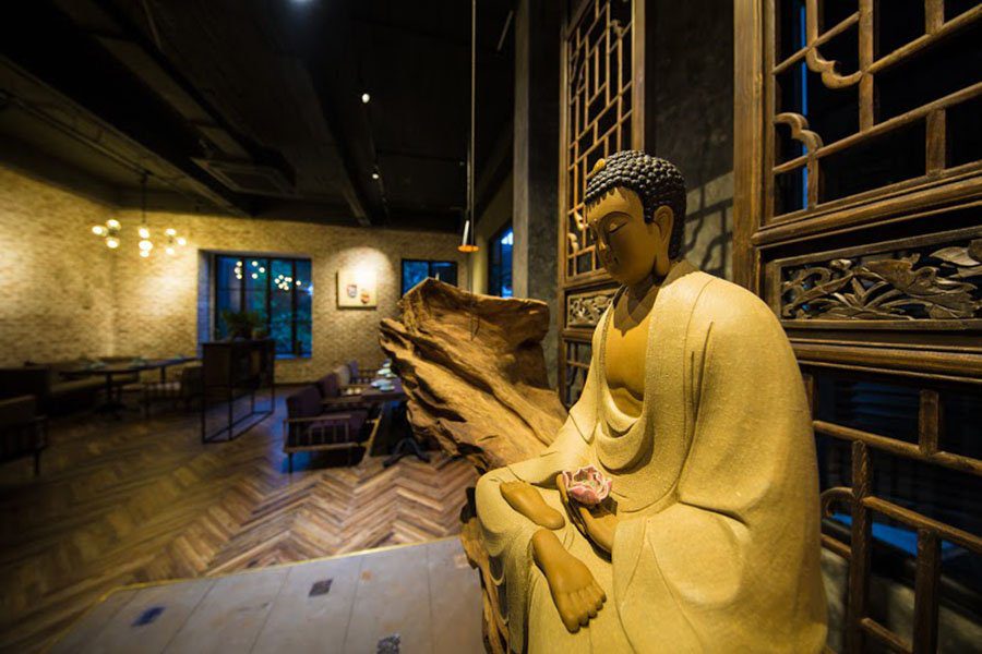 The Buddha statue in the Uu Dam Chay restaurant in Hanoi