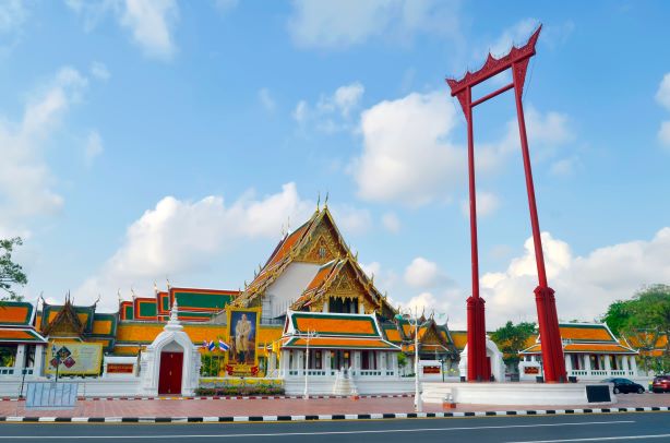 Giant red swing outside Wat Suthat.