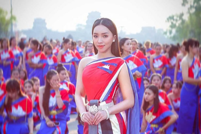 A Cambodian girl wearing a traditional costume inspired by the flag.