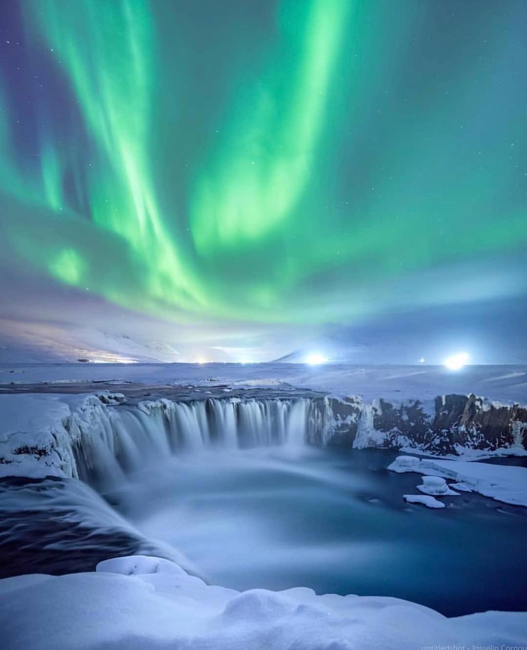 Goðafoss waterfall, Iceland under the northern lights.