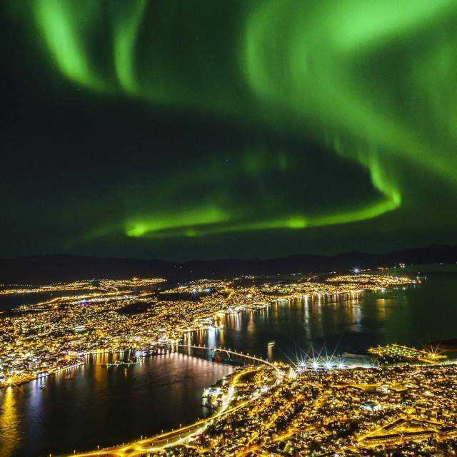 Tromso Norway is one of the best places to experience the Northern Lights. 